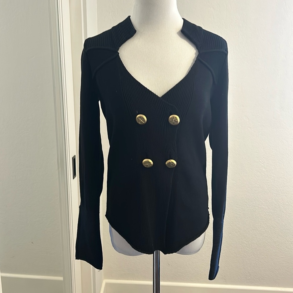 Stunning and classic cardigan sweater with ornamental brass buttons